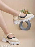 Synthetic cream round toe Mary Janes with white lace detailing, suitable for women & girls. India origin