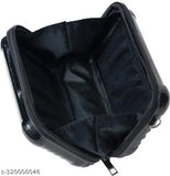 A black sling bag with adjustable strap, ideal for carrying essentials