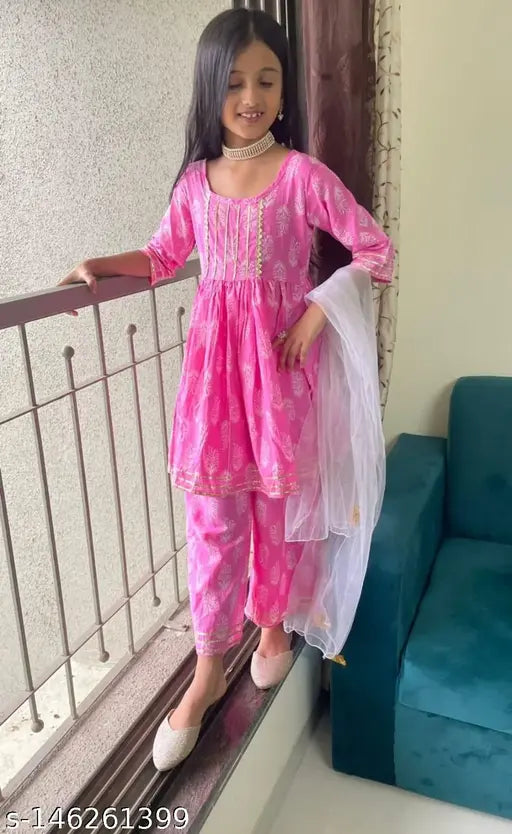 Pastel pink cotton kurti-plazzo set with white shimmered net dupatta, Indian kid's fashion on display