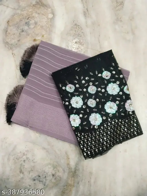 Purple and black patterned silk saree with matching blouse