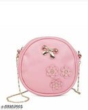 Pink floral sling bag with chain strap and bow closure