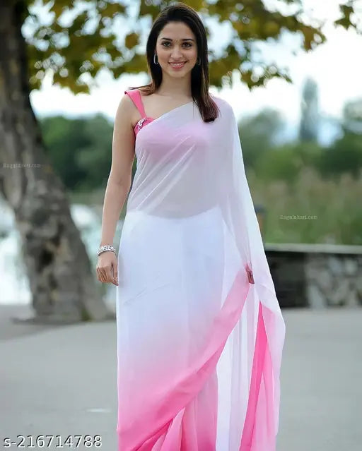 Pink and white saree with a design