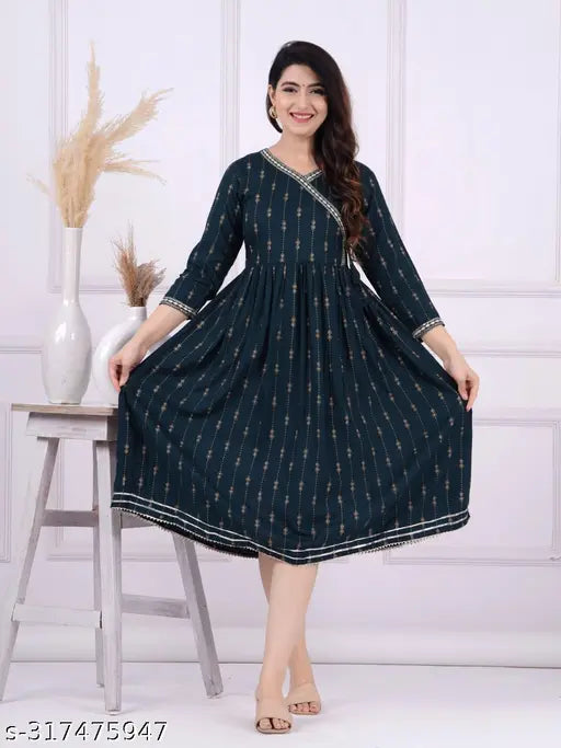 A long, knee-length, sleeveless women's printed dress