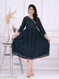 A long, knee-length, sleeveless women's printed dress