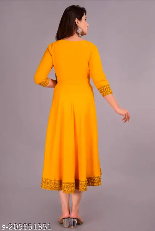 Yellow silk kameez woman's fashionable wear