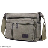 Green canvas cross-body sling bag with multiple pockets, shoulder strap. For travel, office, or business use
