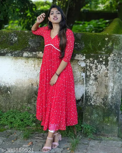 White and red heart pattern Georgette fabric dress, V-neck Alia cut kurti with comfortable fit and stylish design. Single size options: M (Bust 38in, Size Length 48in), L (Bust 40in, Size Length 49in), XL (Bust 42in, Size Length 49in), XXL (Bust 44in, Size Length 49in). Made in India