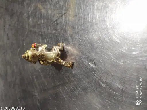 Brass figurine of Lord Gopal, small, numbered 1, with blue eyes