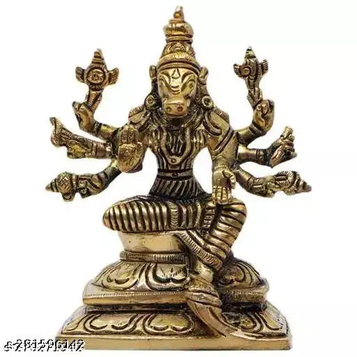 Varahi Amman figure, golden, seated posture, four arms, intricate detailing