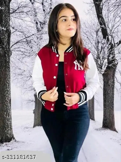 Stylish maroon jacket with zip closure, worn by a woman against a snowy backdrop
