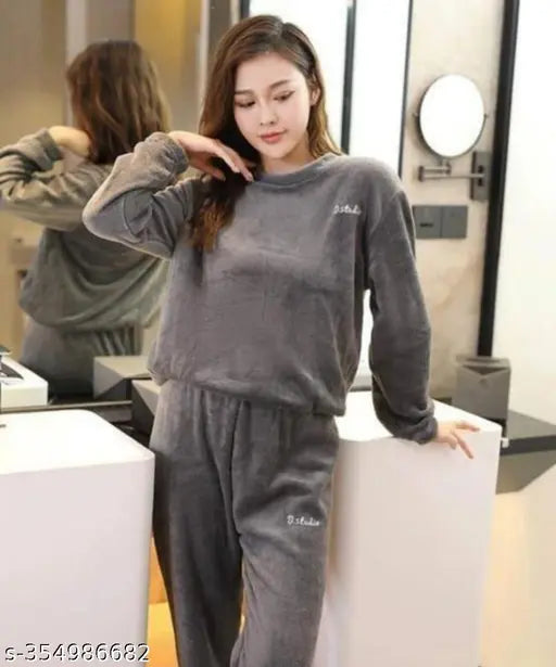 Women's warm wool night suit, trendy solid-colored design. Made from wool fabric. Perfect for winter nights." (104 characters)