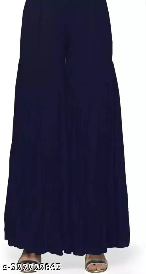 Navy blue embroidered women's kurta with round neck and no sleeves