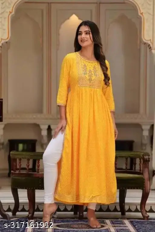 Yellow rayon Naira cut kurti, trendy embroidery work for women's ethnic wear, three-quarter sleeves