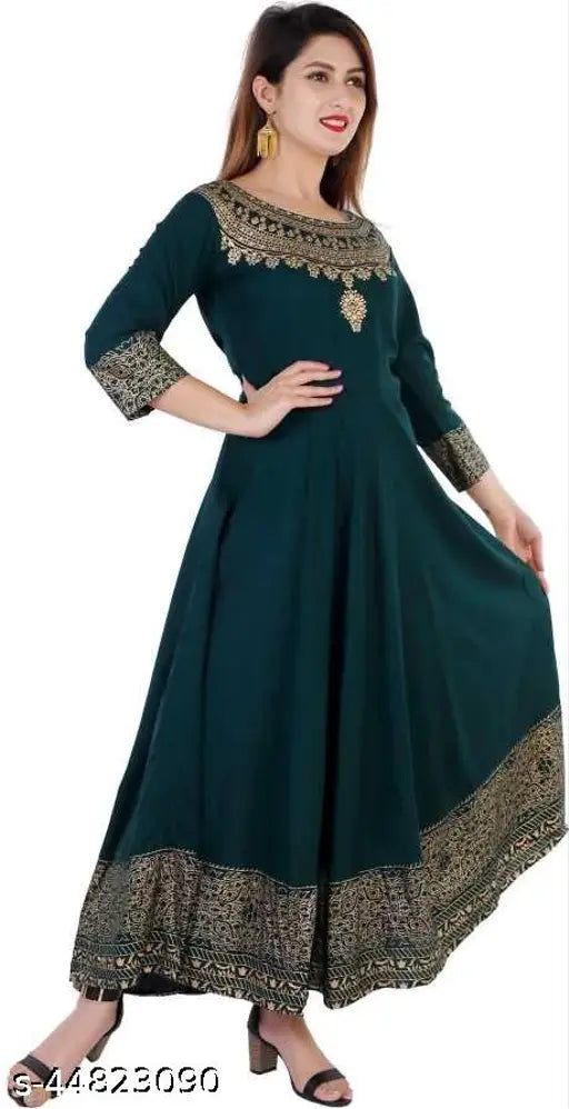 Gold cotton anarkali kurti with dupatta, three-quarter sleeves, solid print, Indian women's fashion accessory on hanger