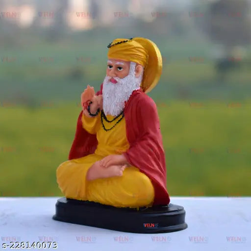 Delicate, graceful Guru Nanak Ji idol from India, showcasing serene seated posture with blessings extended