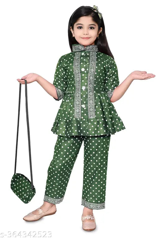 Festive rayon kurta set with hand bag for girls, Indian ethnic fashion featuring printed A-line top and salwar bottom