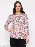 Printed cotton blend women's top with three-quarter sleeves, vibrant pattern on short size