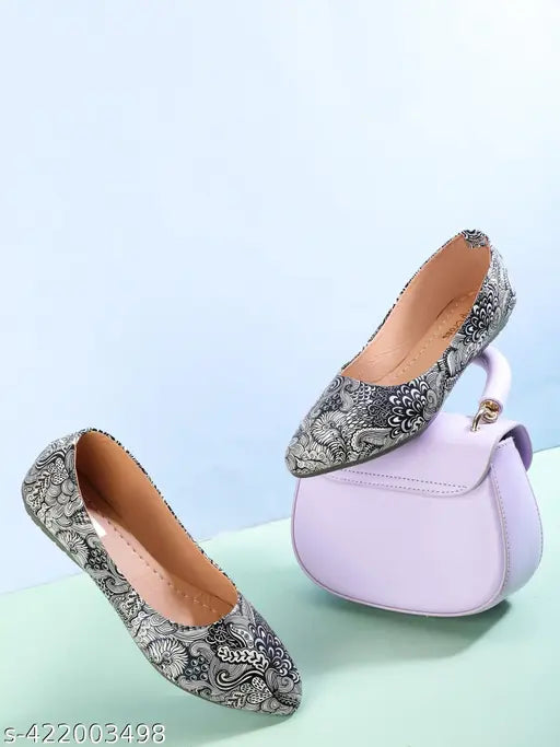 Black synthetic drip cross ballet flats, lace-up design with metal bow clasp