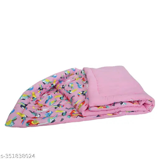 Handmade pink parrot baby quilt, Indian-origin cotton print with polyfill filling, ideal for mild winter crib sizes (40in x 31in)