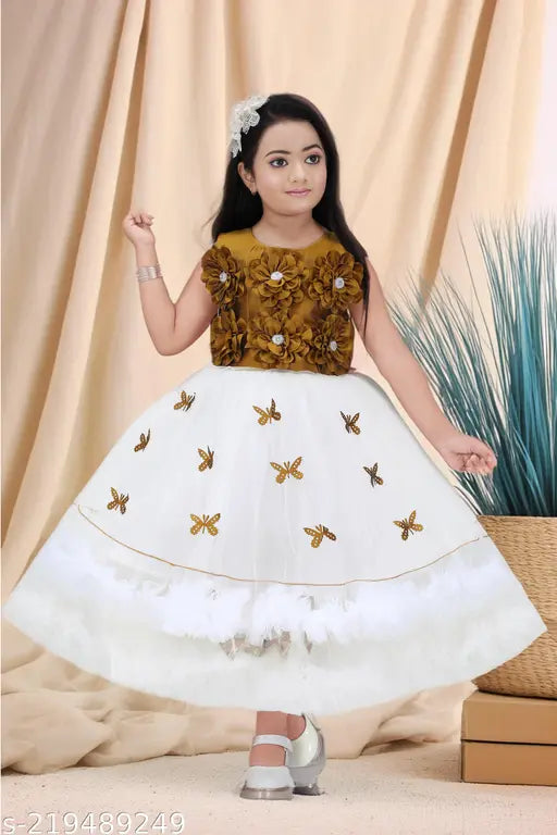 Elegant white and pat bodi colored net frock with gold butterfly and floral embellishments for girls aged 4-10 years, Indian handcrafted party wear with lace patterns on display