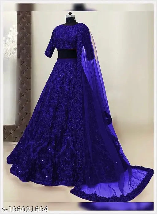 Taffeta silk lehenga for women, embroidered top and net dupatta, traditional Indian attire on display