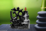 Handcrafted black resin OM design fountain incense holder with 10 scented cones, creating a smokey waterfall effect in home decor