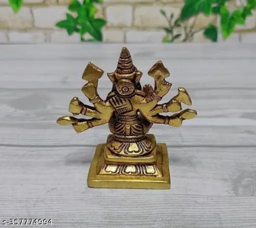 Brass 8-handed Varahi Amman god idol, intricate Indian spiritual statue, detailed miniature figurine on display