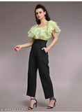 Green Lycra short-sleeve VU jumpsuit on model, dyed/washed pattern for women's casual wear. Multiple sizes available (S-XXL). Made in India