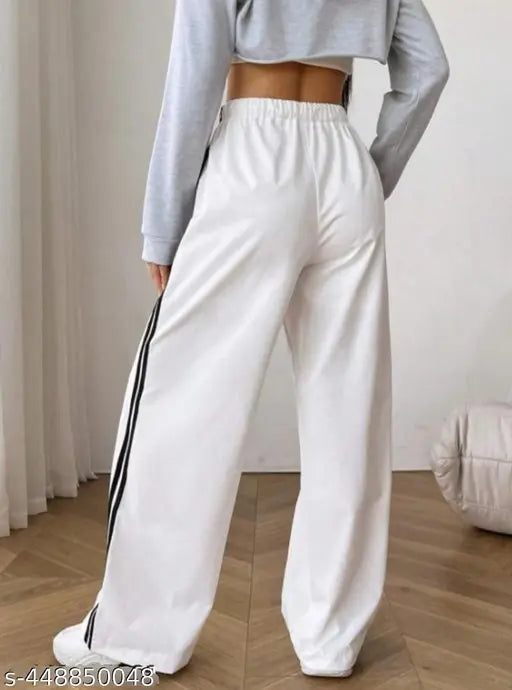 White cotton-blend striped winter trousers on clothing rack
