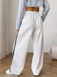 White cotton-blend striped winter trousers on clothing rack