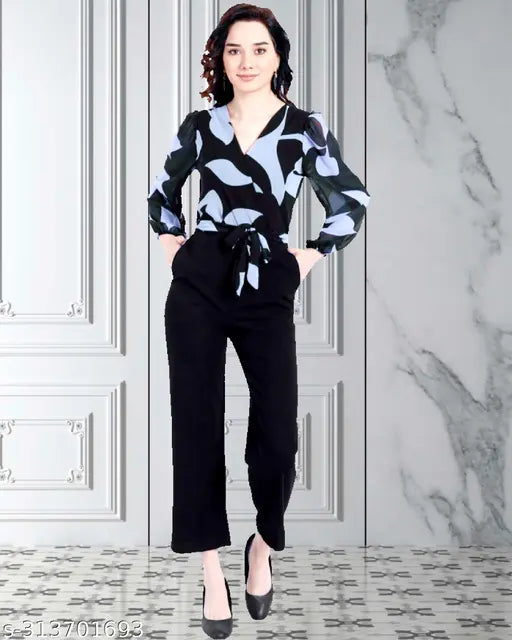 Multicolor floral printed long jumpsuit for women in Georgette fabric with long sleeves, featuring a vibrant print. Model wears size L (XS: 34-30-50, S: 36-32-50, M: 38-34-50, L: 40-36-50, XL: 42-38-50, XXL: 44-40-50, XXXL: 46-42-50). Made in India