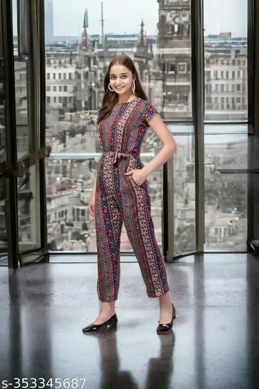 Vibrant printed crepe jumpsuit, wrap style with tie waist, perfect for any occasion