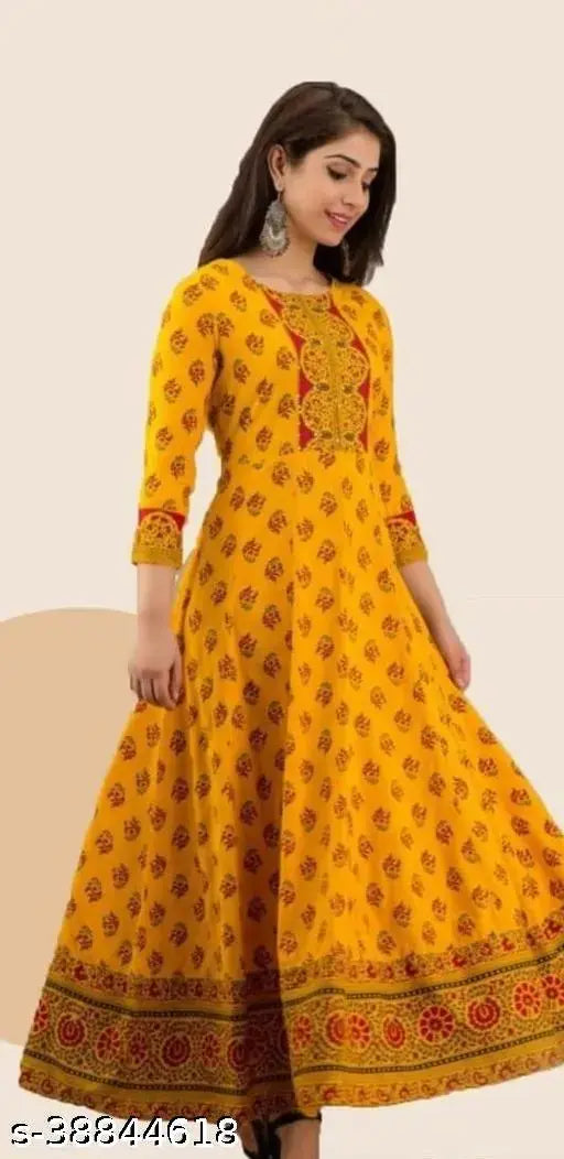 Yellow printed kameez with floral pattern, long sleeves, and a round neckline