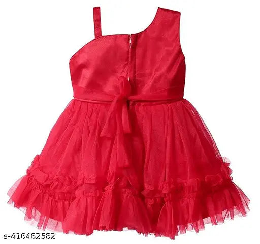A red net dress with a lace overlay, knee length, one shoulder design