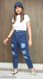 Fashionable women's blue jeans with distressed rips and wide legs, black t-shirt