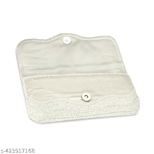 Women's white embroidered fabric clutch with zip closure