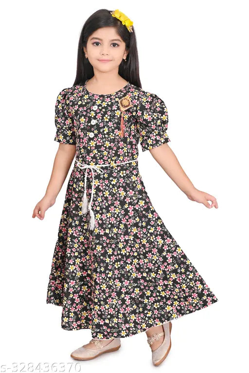 Modern Tandy baby girls gown, printed net with short sleeves. High-quality polycotton, good fitting for 9-12 months to 3-4 years. India origin