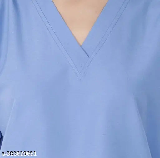 Blue polyester scrub suit for nurses/doctors, essential healthcare attire on hanger