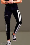Black skinny jeans, sporty white stripes on legs