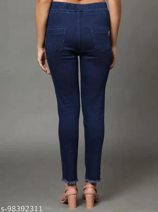Denim skinny fit stretchable medium waist elastic belt closer ankle length solid royalblue jeggings for women on model, fashion forward casual wear for women, denim jeggings India