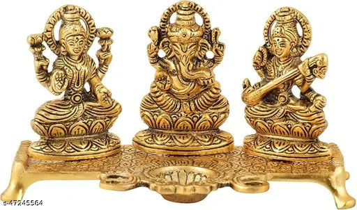 Handcrafted gold-plated metal Wacky Laxmi Ganesh Saraswati idol with diya, traditional and elegant decor for home or worship (24cm x 12cm x 6cm)