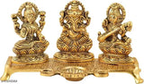 Handcrafted gold-plated metal Wacky Laxmi Ganesh Saraswati idol with diya, traditional and elegant decor for home or worship (24cm x 12cm x 6cm)