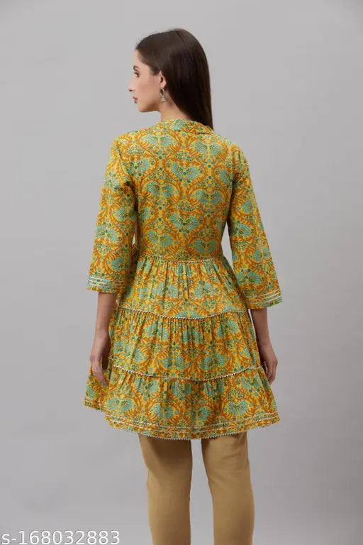 Muatard cotton blend women's round neck tunic with 3/4 sleeves, printed pattern