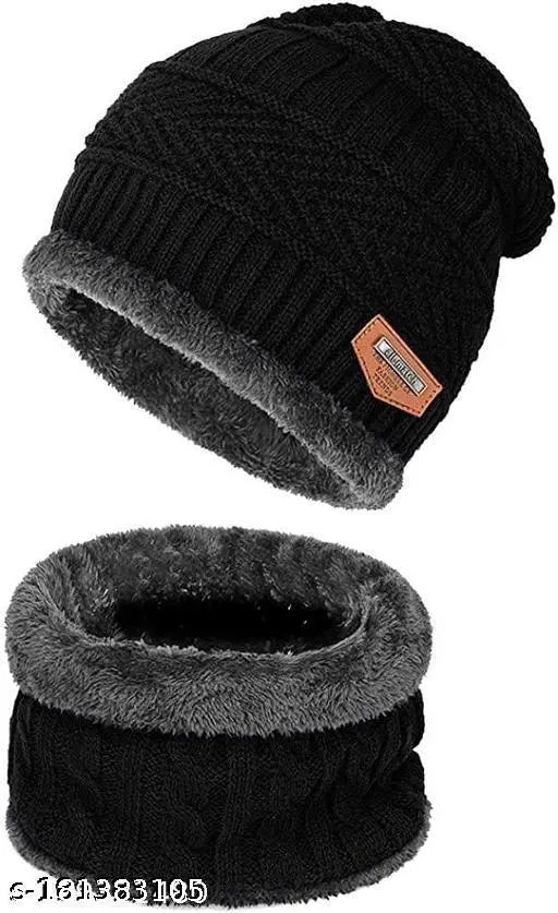 Black knit winter beanie cap with faux fur trim and logo tag