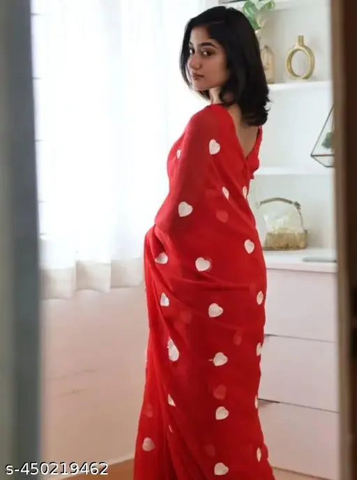Red silk saree with heart pattern on border