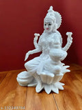 Cultured marble Lakshmi statue, 18 cm tall, Hindu goddess of wealth and prosperity. Marble figurine depicts Laxmi in an indoor setting