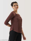 Brown cotton-blend top with three-quarter sleeves, elegant crew neckline, and long silhouette. Prettify women's casual wear from India. Solid design adds modern style to Indian fashion