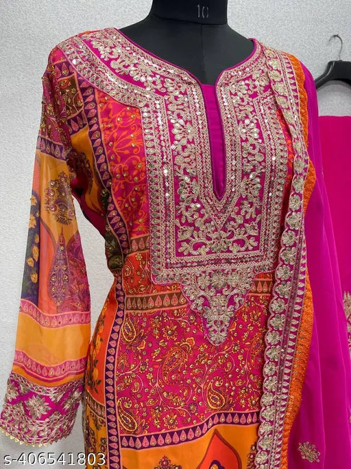 Pink and gold georgette heavy designer suit with matching dupatta