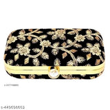 Black embroidered clutch with gold accents, zip closure