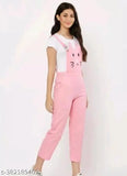 Black cotton blend printed Persian jumpsuit for women on model, featuring short sleeves and a shirt design